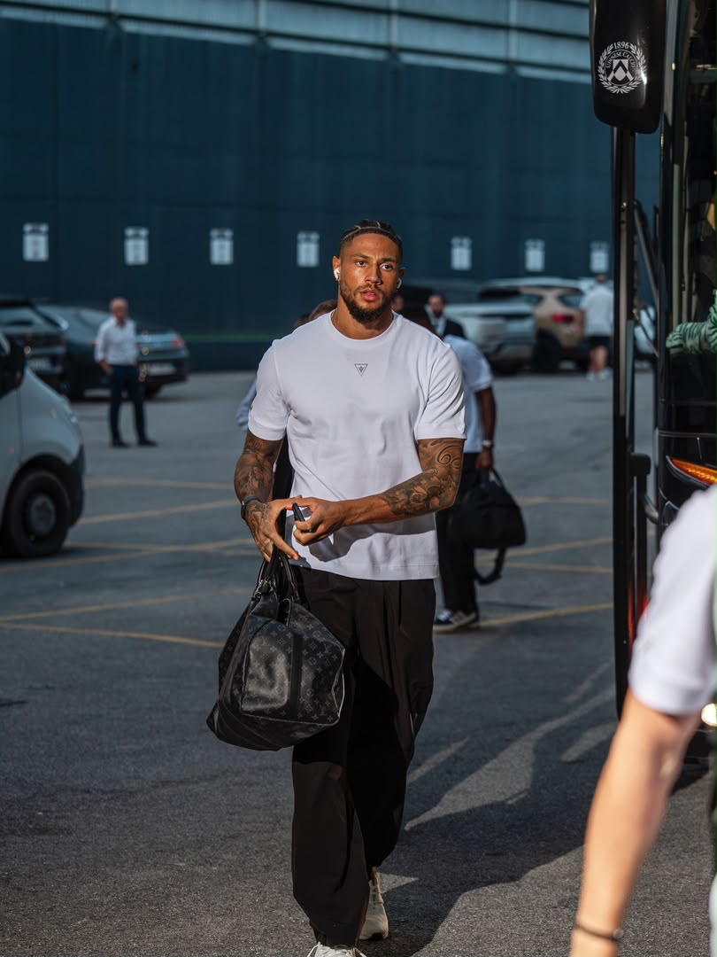 Maduka Emil Okoye arriving with a bag